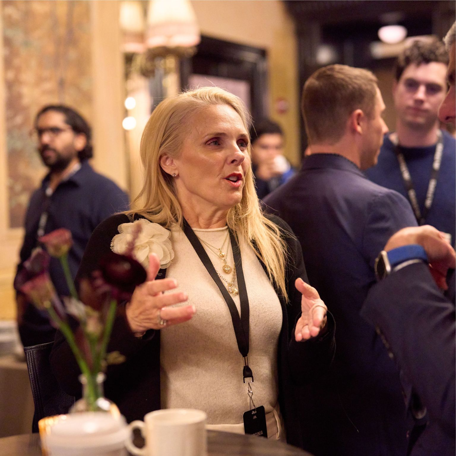 An attendee talking during the reception